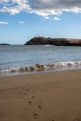 Atlantic ocean beach and a hill, Gran Canaria, Spain