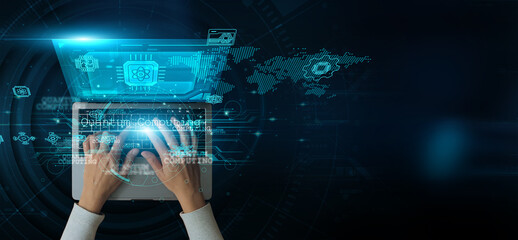Man using a laptop with quantum computing on the keyboard analyzes and develops various information...