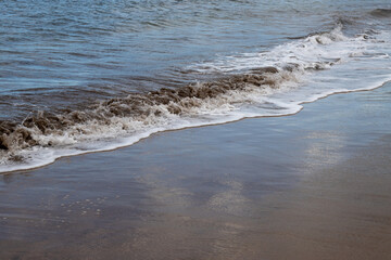 Sand beach and a line of the tide, Gran Canaria, Spain