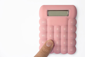 Finger pressing number one on pink calculator on white background