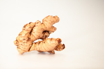 Fresh Ginger Root – Knobby Earthy Texture Isolated on White Studio Light