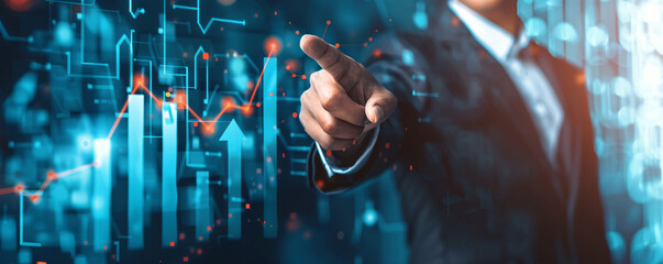 Businessman pointing at virtual growth charts