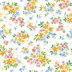 Beautiful floral pattern in small flowers. Small bright multicolor flowers. White background. Cute Ditsy print. Floral seamless background. Gentle template for fashion prints. Easter Stock pattern. 