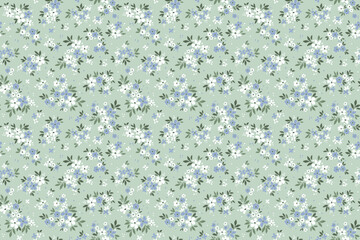 Retro floral pattern in small decorative flowers. Small blue and white flowers. Light blue background. Ditsy print. Floral seamless background ditsy pattern in small cute spring flowers. Stock print