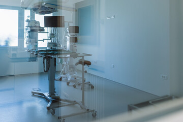 Empty sterile operating veterinary room with surgical instruments and table ready for operation