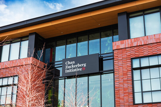 Chan Zuckerberg Initiative CZI sign on the facade of a philanthropic organization headquarters building - Redwood City, California, USA - February 23, 2025