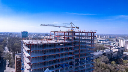 Fototapeta premium Skyscraper Construction Progress in Urban Landscape
