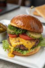 A massive, mouthwatering burger stacked with layers of flavorful ingredients. A feast for the eyes and taste buds, perfect for burger lovers and foodies