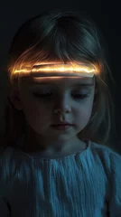 Papier peint photo  A young child's pensive expression illuminated by a glowing headband.  © Hungarian