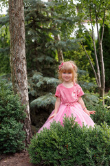 little girl in a pink dress