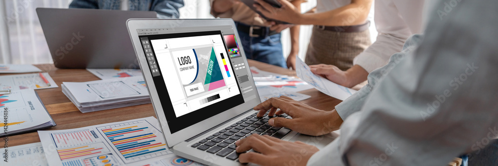 Poster Graphic designer software for modern design of web page and commercial brisk ads showing on the computer screen