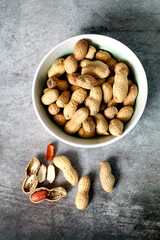 White bowl with peanuts