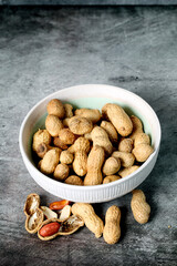 White bowl with peanuts