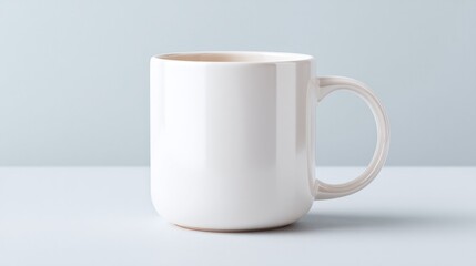 Fototapeta premium pristine blank mockup showcases cup dimly lit against seamless white backdrop ideal for clean image needs