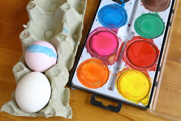 Watercolor palette tool set. Painting easter eggs.