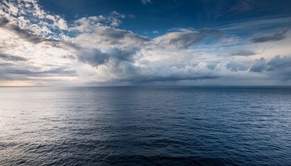 Obraz premium overcast sky above calm sea