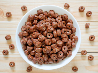 Chocolate cereal on wooden background