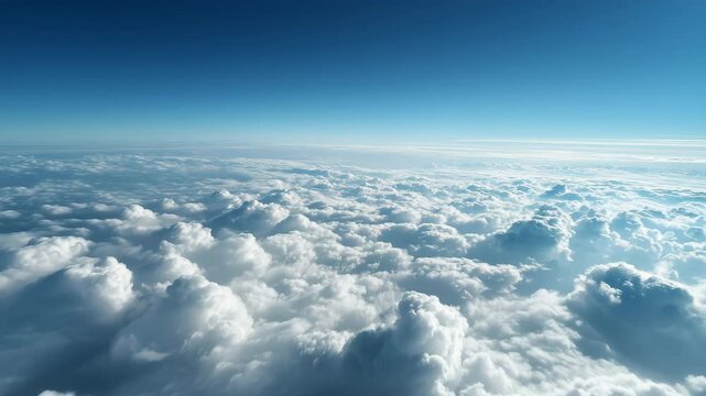 Flying above the clouds. Aerial view of clouds at sunrise. Traveling by air perfect background, 4k,beautiful blue sky with soft white clouds timelapse for abstract background