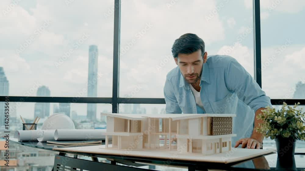 Poster handsome caucasian engineer or project manager measure check, inspect, look at house model and writi