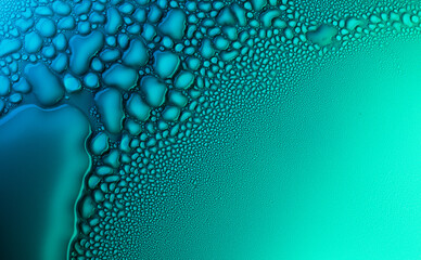 Abstract wallpaper, colorful water drops background. Water drops close up. Abstract Blue and green...