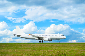 Airplane riding on the runway ready for taking off, travel background with airplane with blank livery, air travel background