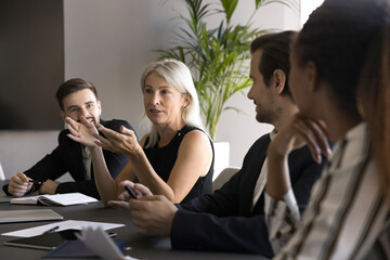 Expert consultation. Inspired senior adult businesswoman ceo leader boss speak on team briefing...