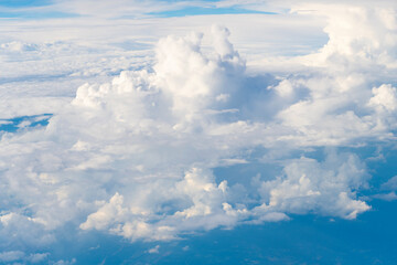 Blue Sky with Fluffy White Clouds on a Sunny Summer Day. Cloudscape - Blue sky and white clouds....