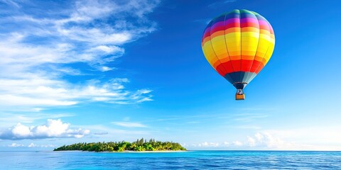 Fototapeta premium rainbow hot air balloon flying over island 