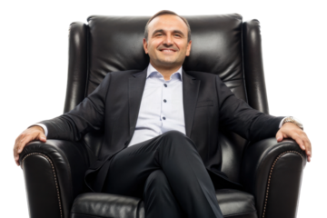 Confident businessman relaxing in an elegant leather chair with a smile in a modern office setting