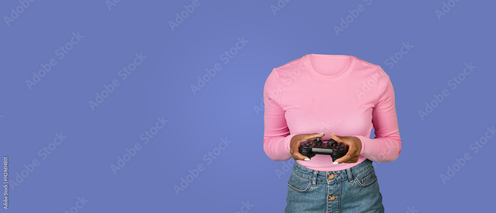 Poster a person enjoying a gaming session stands against a plain blue background, holding a gaming controll