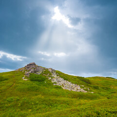 green mountain  ridge under a sparkle sun, summer mountain travel scene
