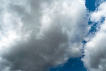 A terrible black cloud hangs in the sky before the rain. Bad weather. Hurricane and thunder over the city. Climate change and natural disasters. Bad mood and despondency.