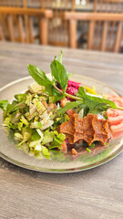 Cig kofte, a raw meat dish in Turkish and Armenian cuisines. Turkish cig means 