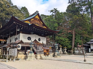 Himure Hachiman-gu architecture details and stone lanterns in serene Shiga, Japan