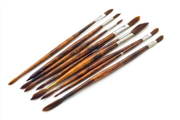 A collection of painting brushes on white isolated on white background.