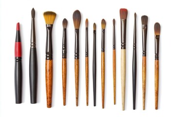 Fototapeta premium A collection of paintbrushes on a white surface isolated on white background.