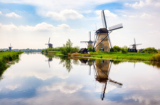 Old, Charming Windmills in Kinderdijk, Netherlands - Powered by Adobe