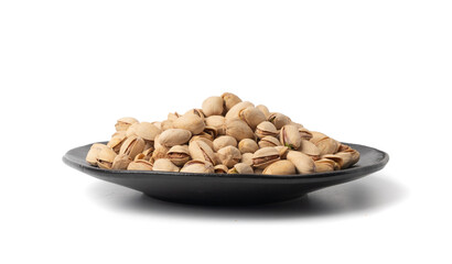 Fried salt pistachio nuts isolated. Baked pistachios pile, roasted green pistache fruit in shell on white