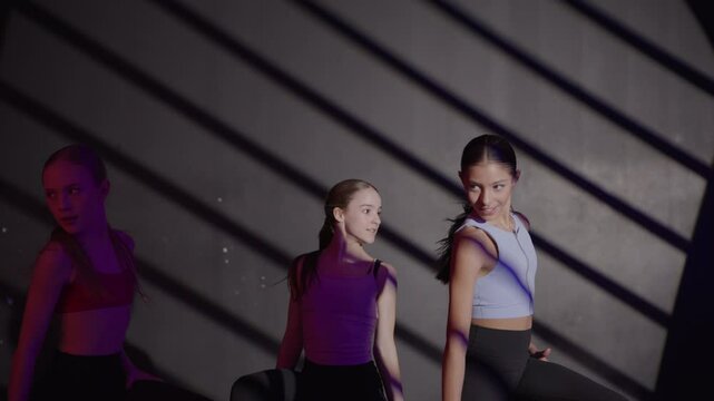 Young girls in dance class performing incredibly majestic dancing
