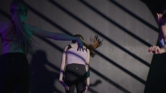 Young girls in dance class performing incredibly majestic dancing