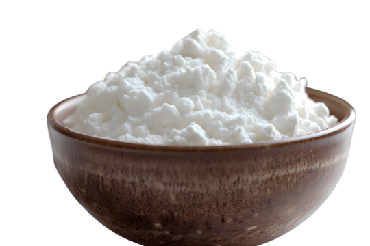 A wooden bowl filled with white granulated substance ideal for culinary and healthrelated con