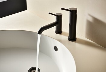 A white kitchen sink sitting on top of a counter.