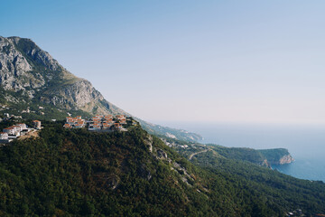 Rich village on Doma Mountain overlooking the bay and the island of Sveti Stefan. Montenegro
