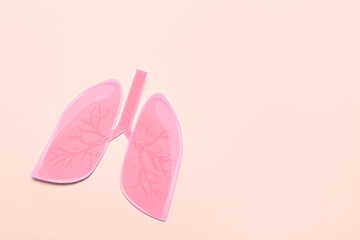 Paper lungs on beige background