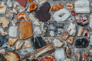 Rocks in cement wall