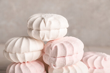 Sweet zefirs on grey background