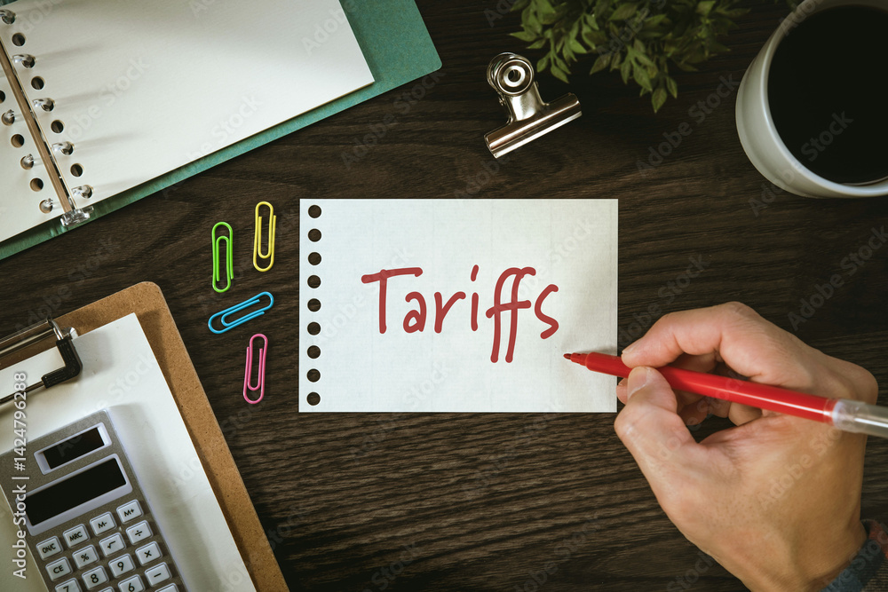 Poster there is notebook with the word tariffs. it is as an eye-catching image.