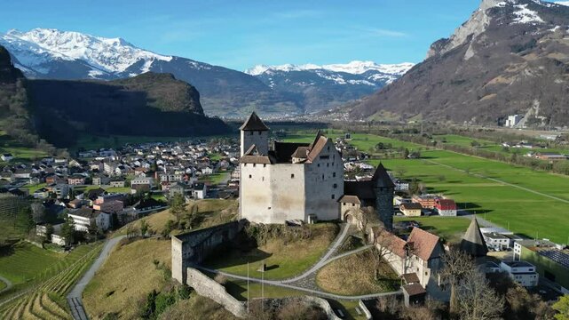Burg Gutenberg castle in Balzers Liechtenstein with St Nicholas church below