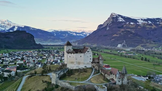 Burg Gutenberg castle in Balzers Liechtenstein with St Nicholas church below