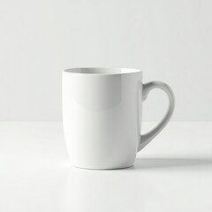A sleek, modern white ceramic mug with a unique heart-shaped handle, resting on a minimalistic white surface.